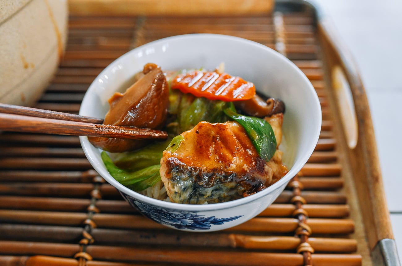 Clay Pot Fish & Tofu spooned over bowl of rice
