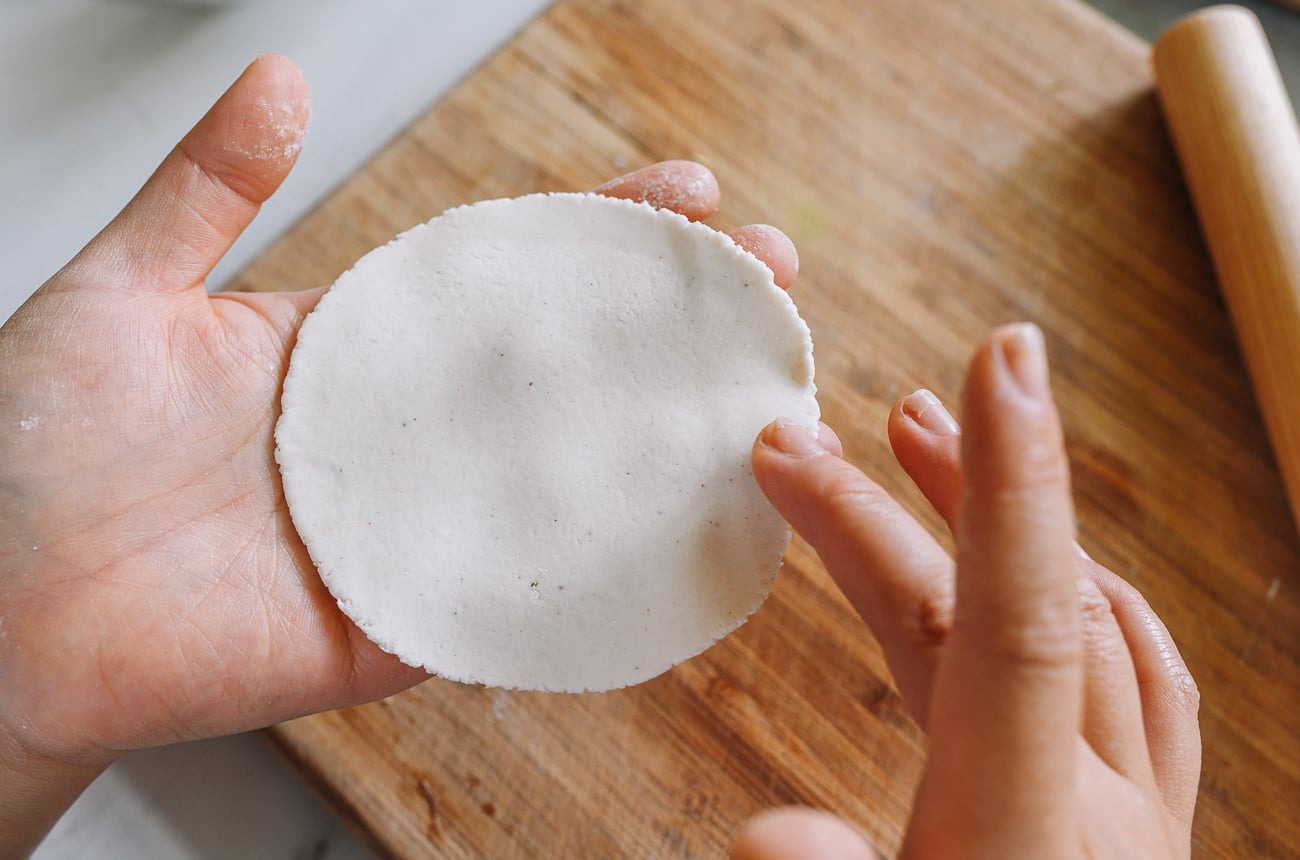 moistening GF dumpling wrapper with water around the edges