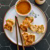 Pan-fried wontons with sesame dipping sauce