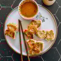 Pan-fried wontons with sesame dipping sauce