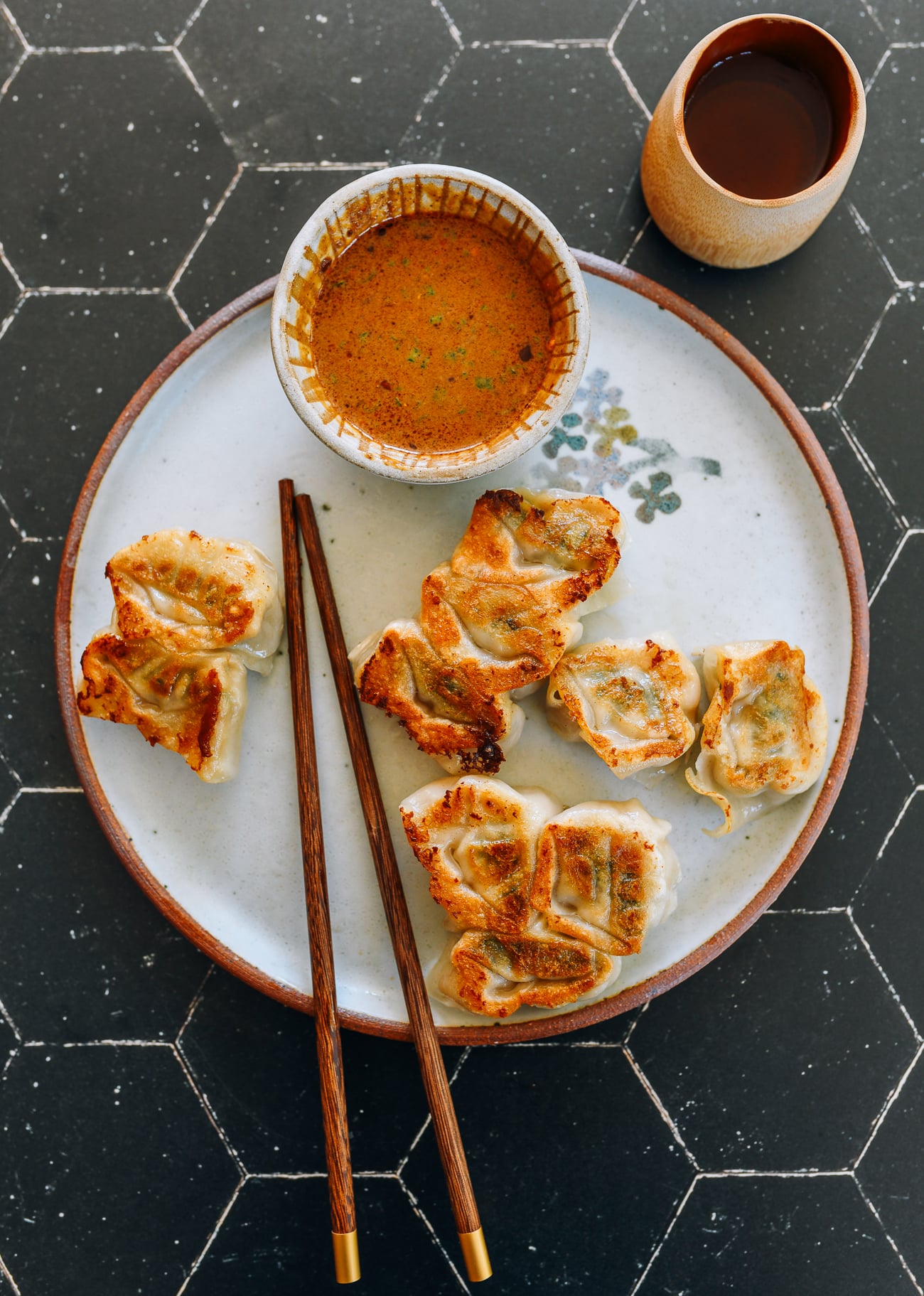 Pan-fried wontons with sesame dipping sauce