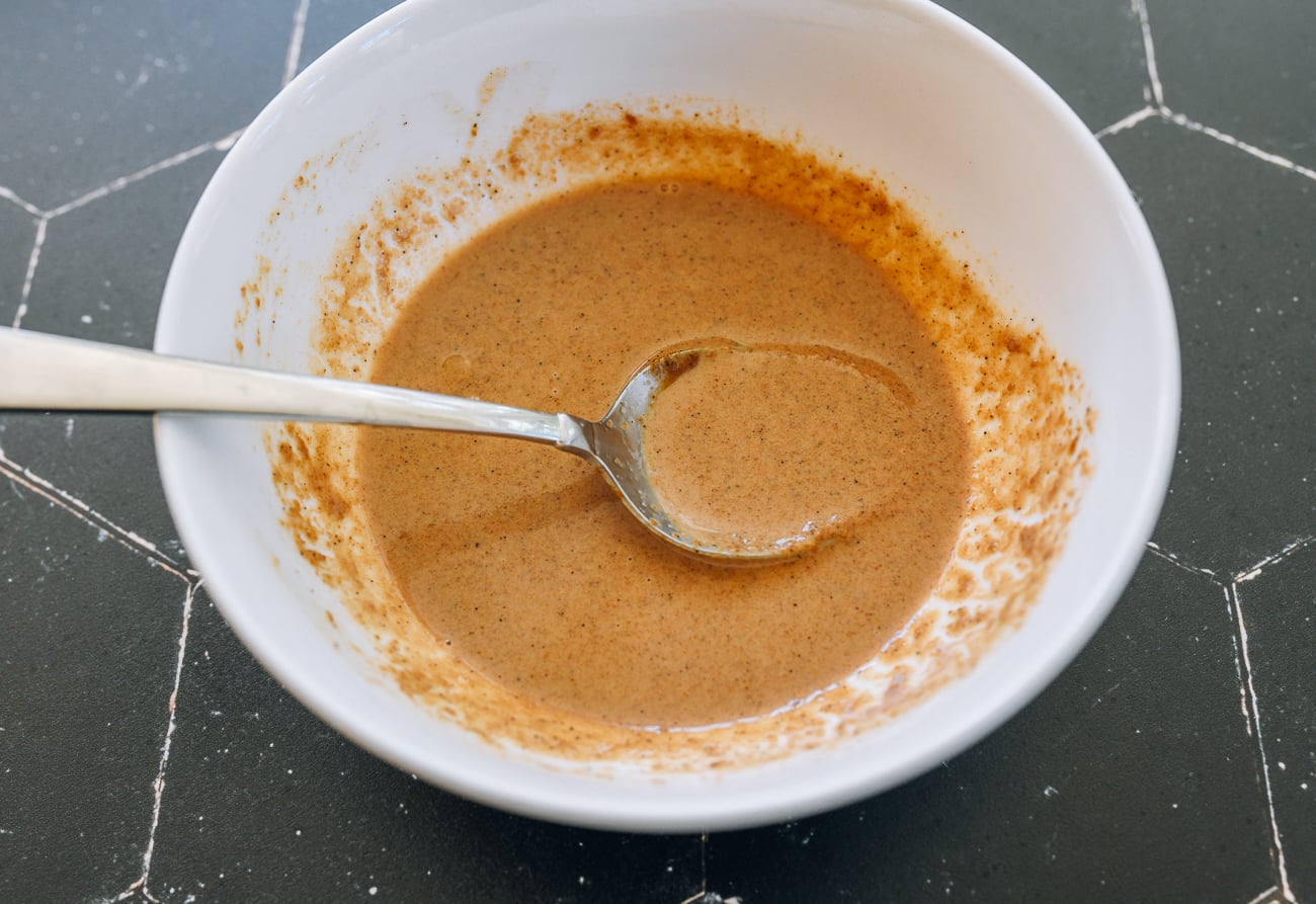 mixing sesame dipping sauce