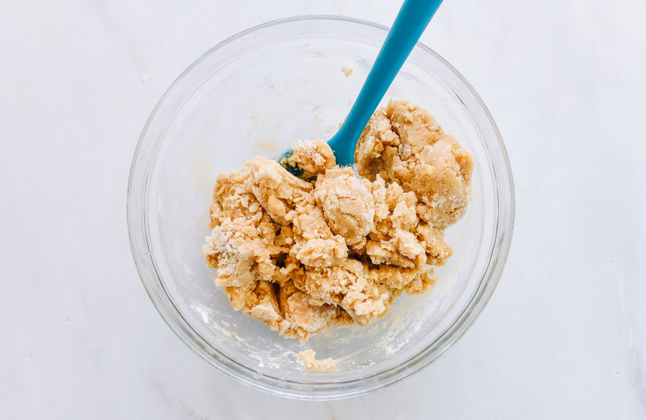 Mixing mooncake dough with rubber spatula
