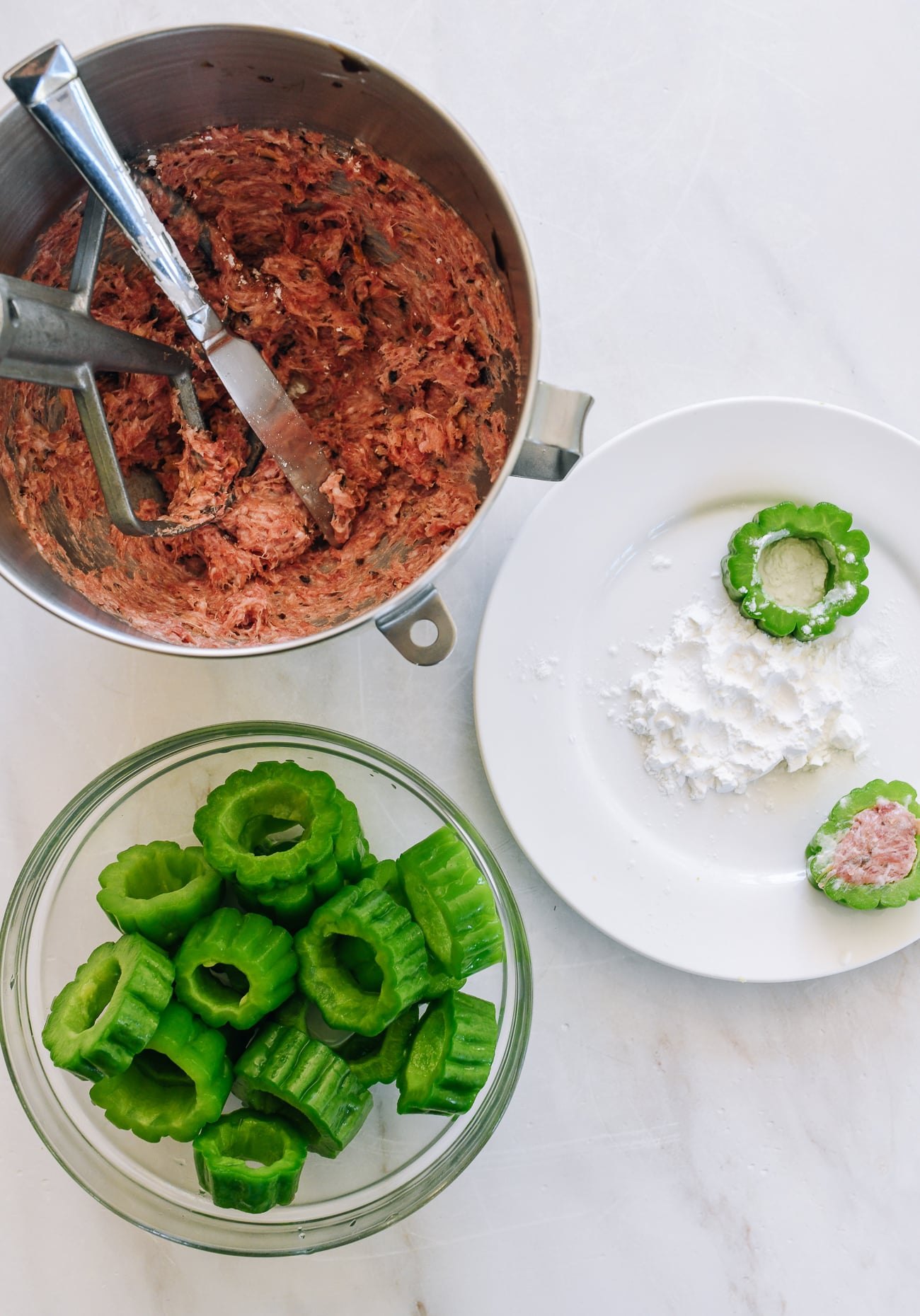 stuffing bitter melon rings with pork filling
