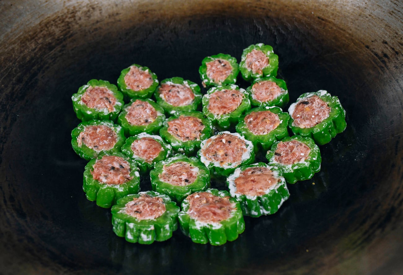pan-frying stuffed bitter melon pieces