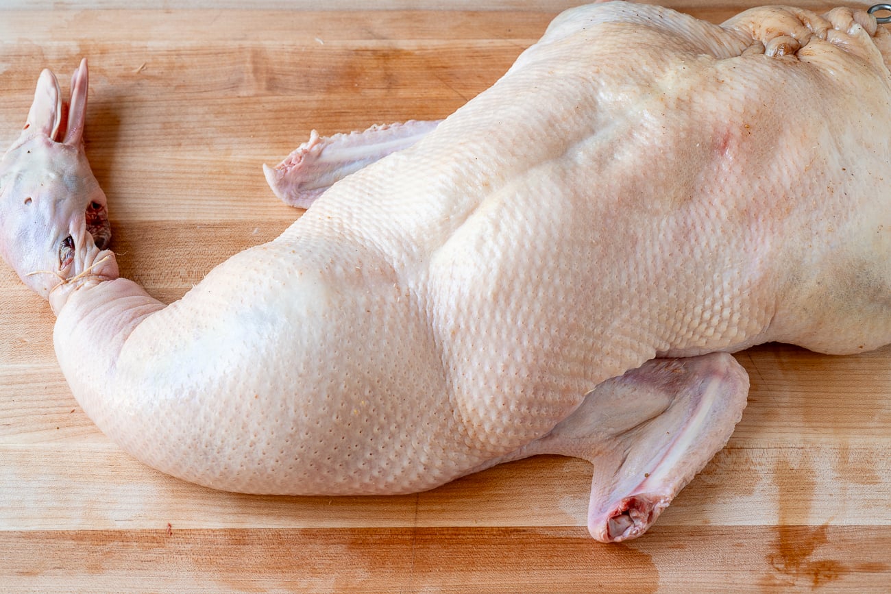 inflating duck before roasting in Chinese technique