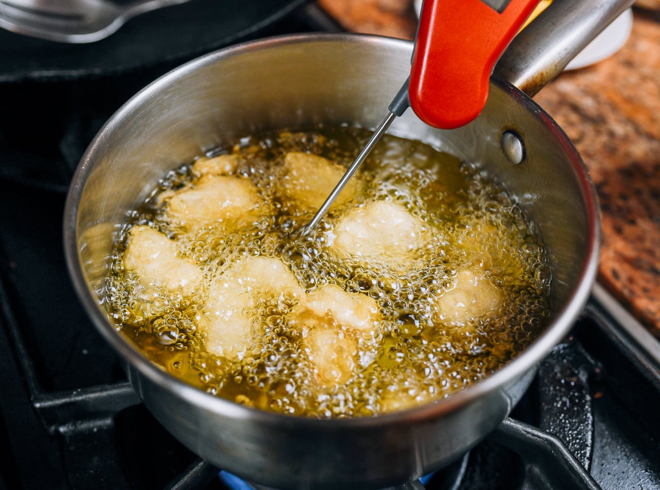 frying battered chicken pieces