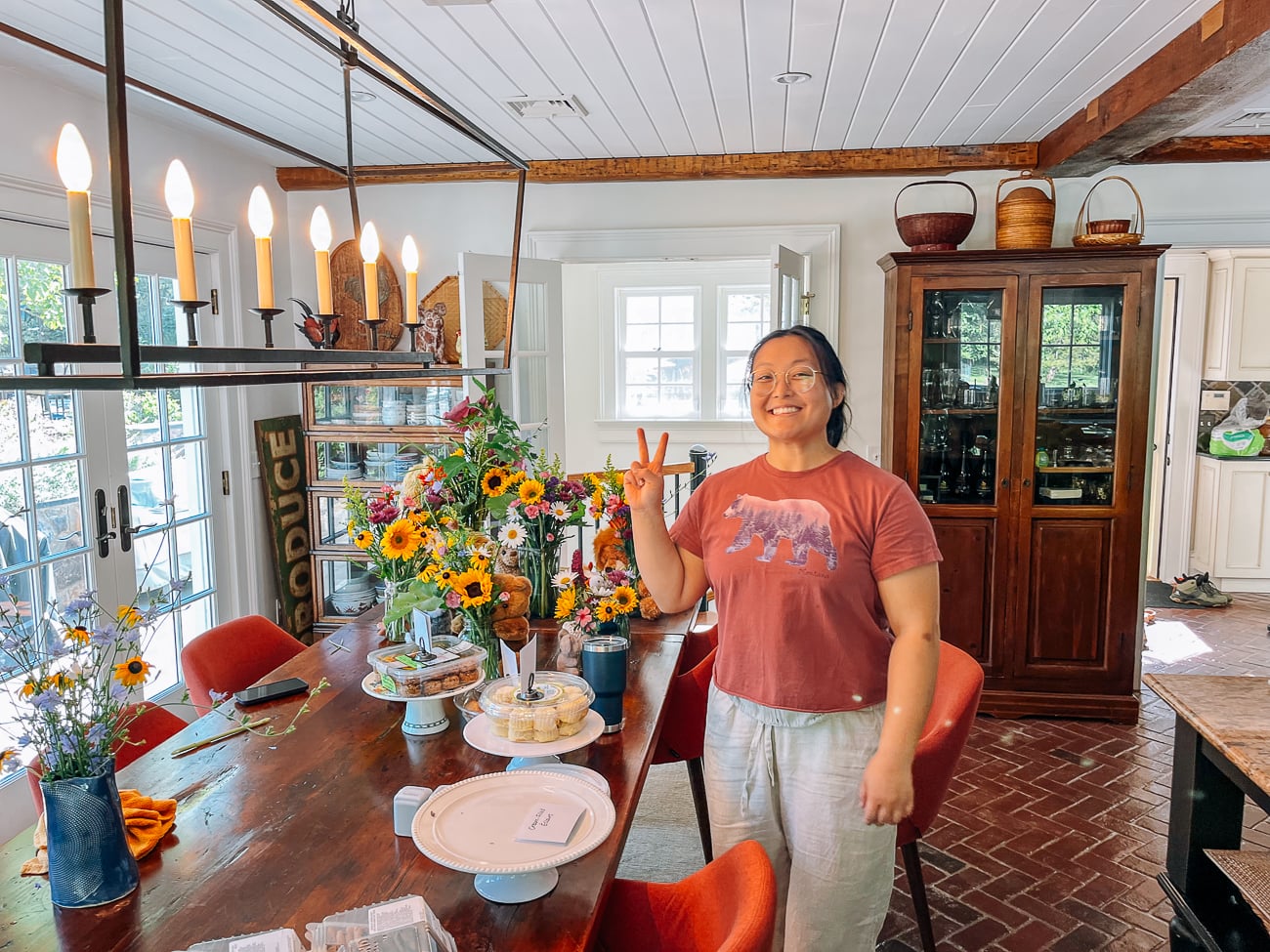 Kaitlin with baby shower flowers