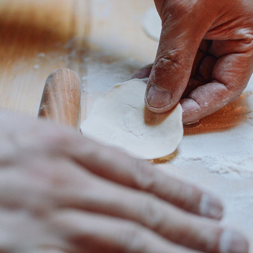 hand rolling dumpling wrapper