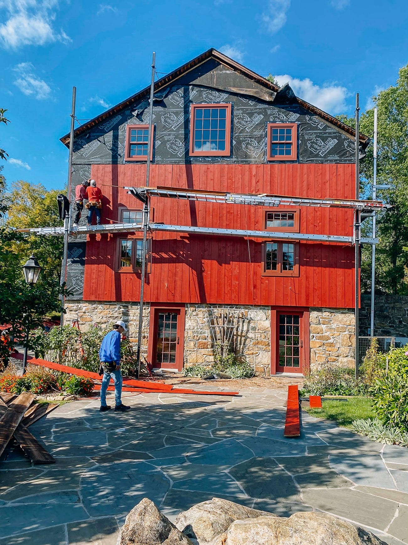 putting siding up on barn