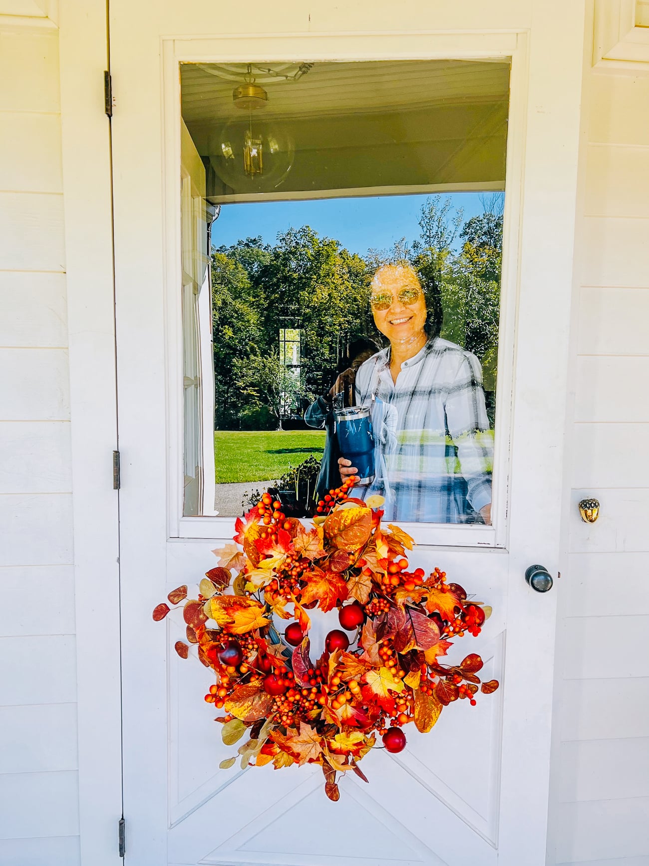 Judy with fall wreath