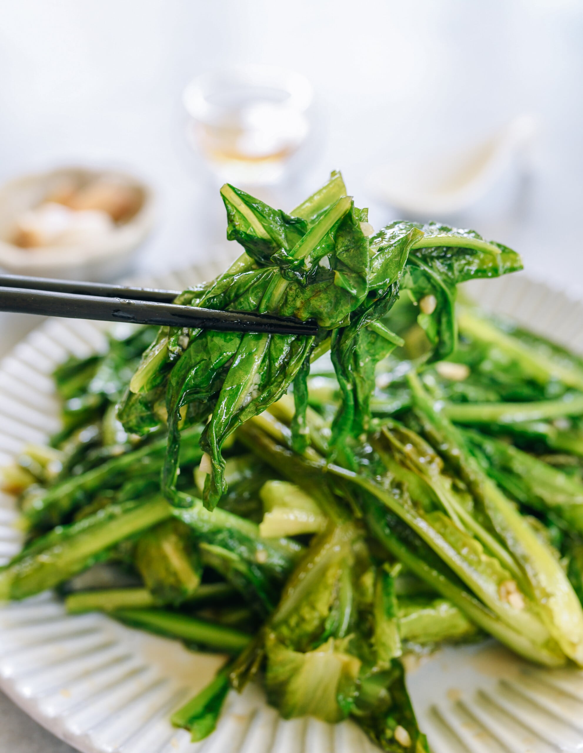 cooked AA Choy picked up by chopsticks