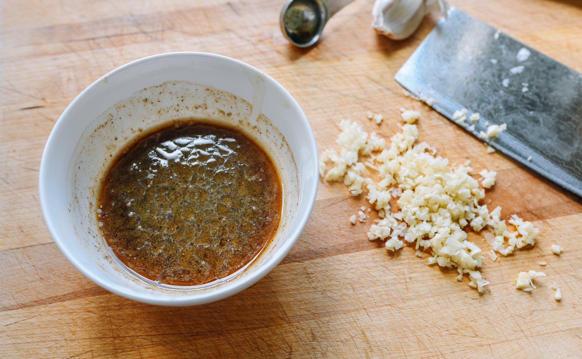 sauce mixture and minced garlic