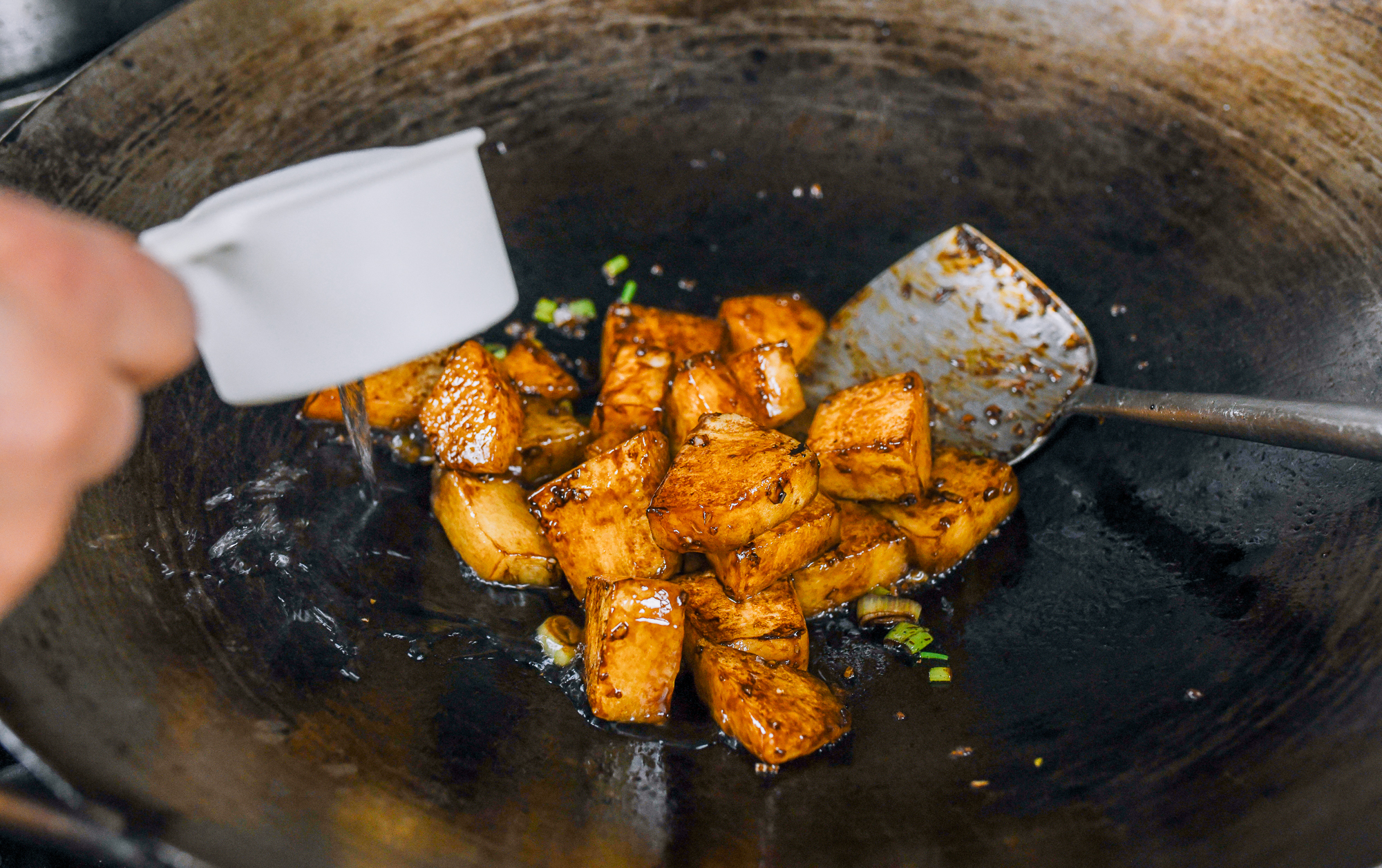 adding water to winter melon to braise