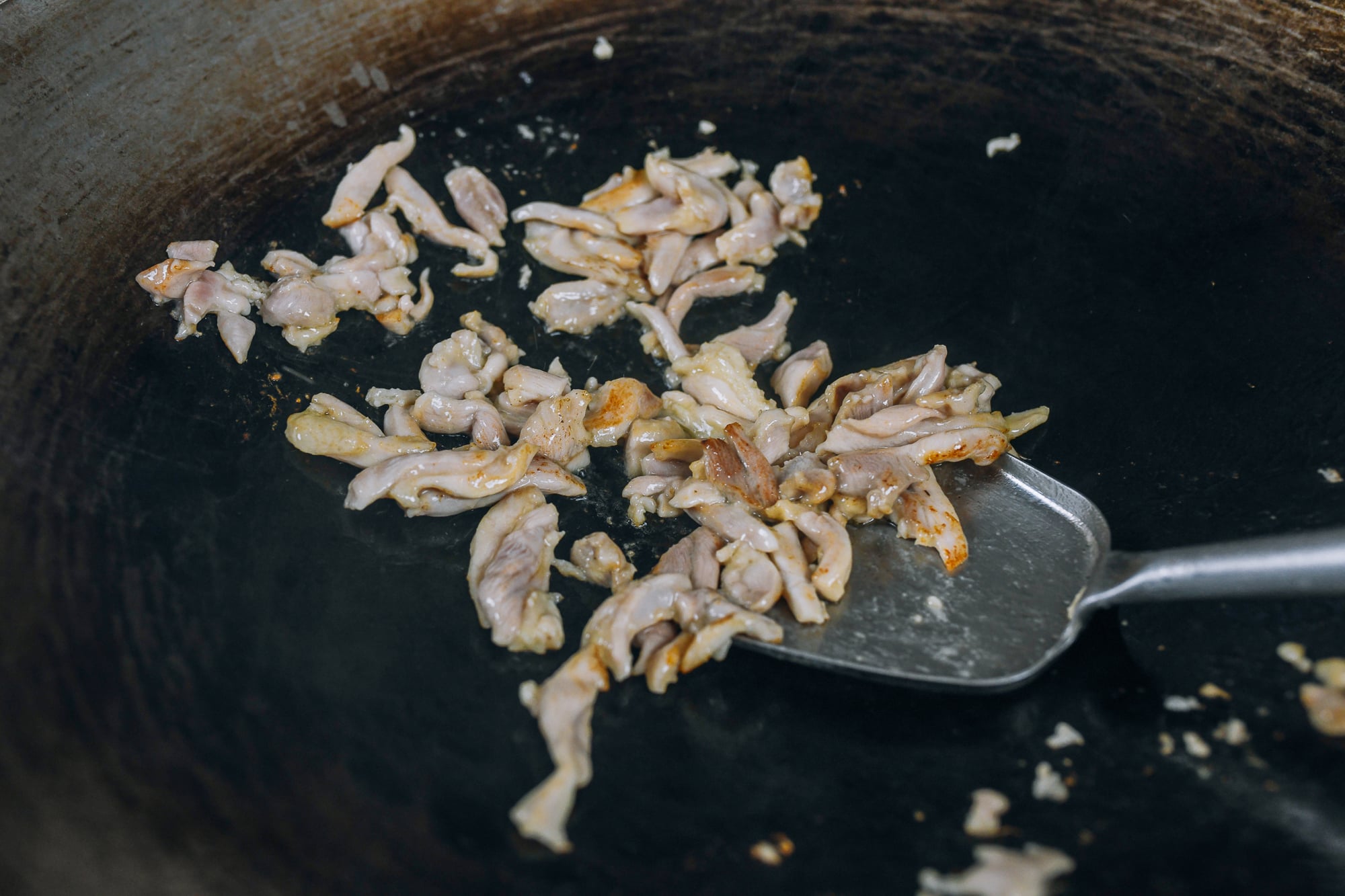 seared chicken in wok