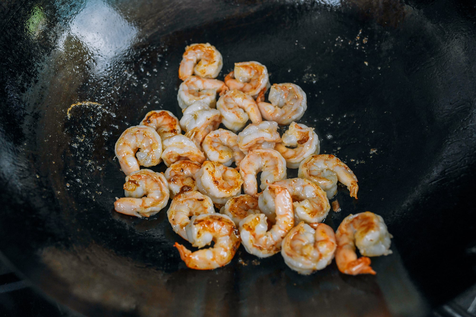 seared shrimp in wok