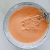 Bowl of yum yum sauce with whisk