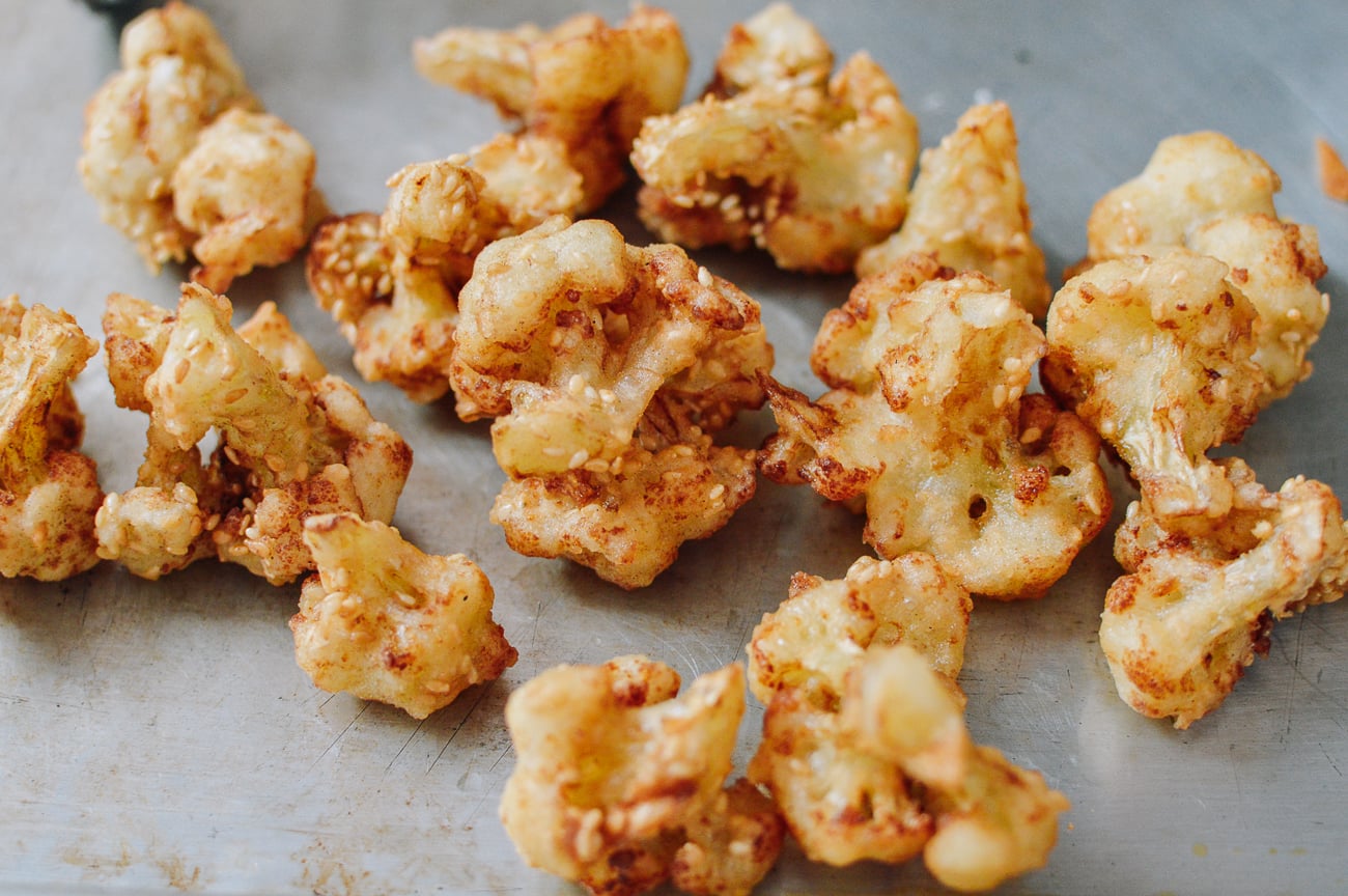 fried cauliflower on baking sheet