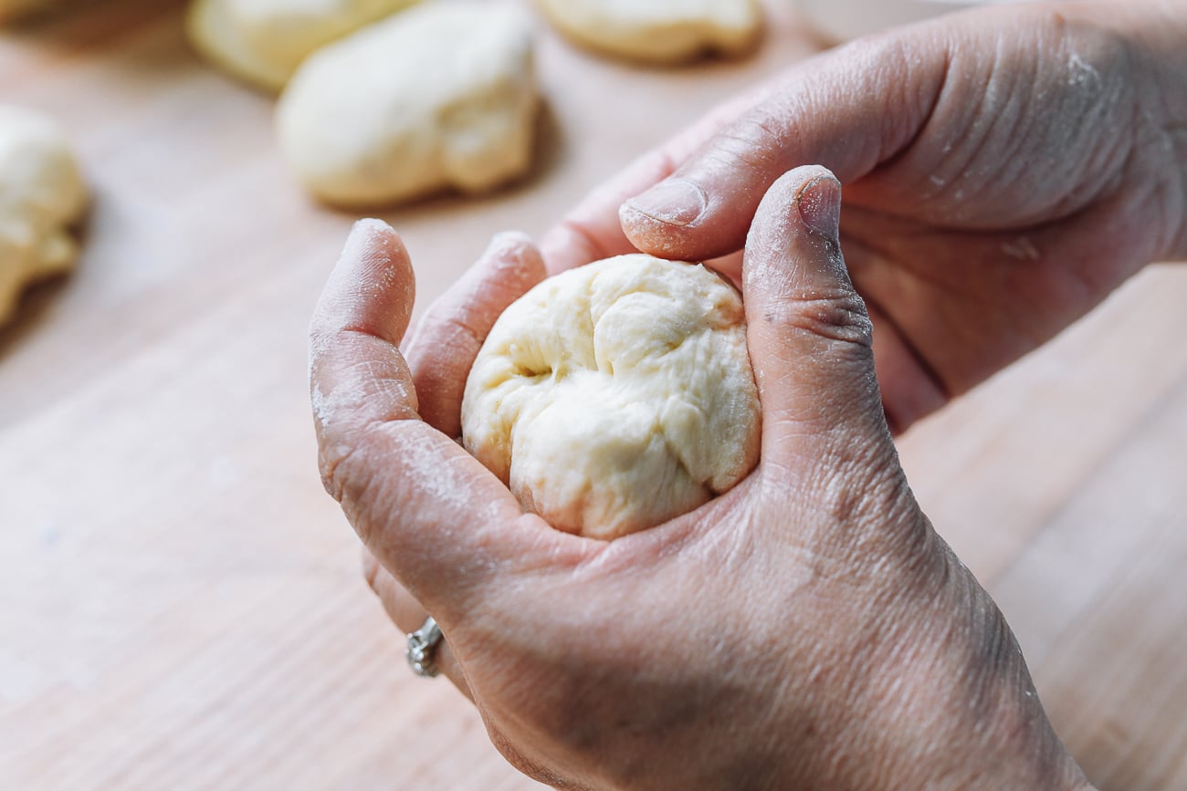 shaping dough into a ball
