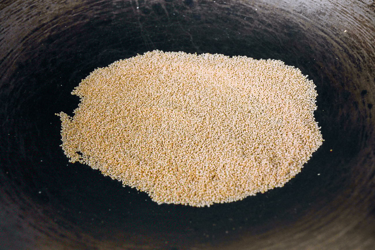 toasted sesame seeds in wok