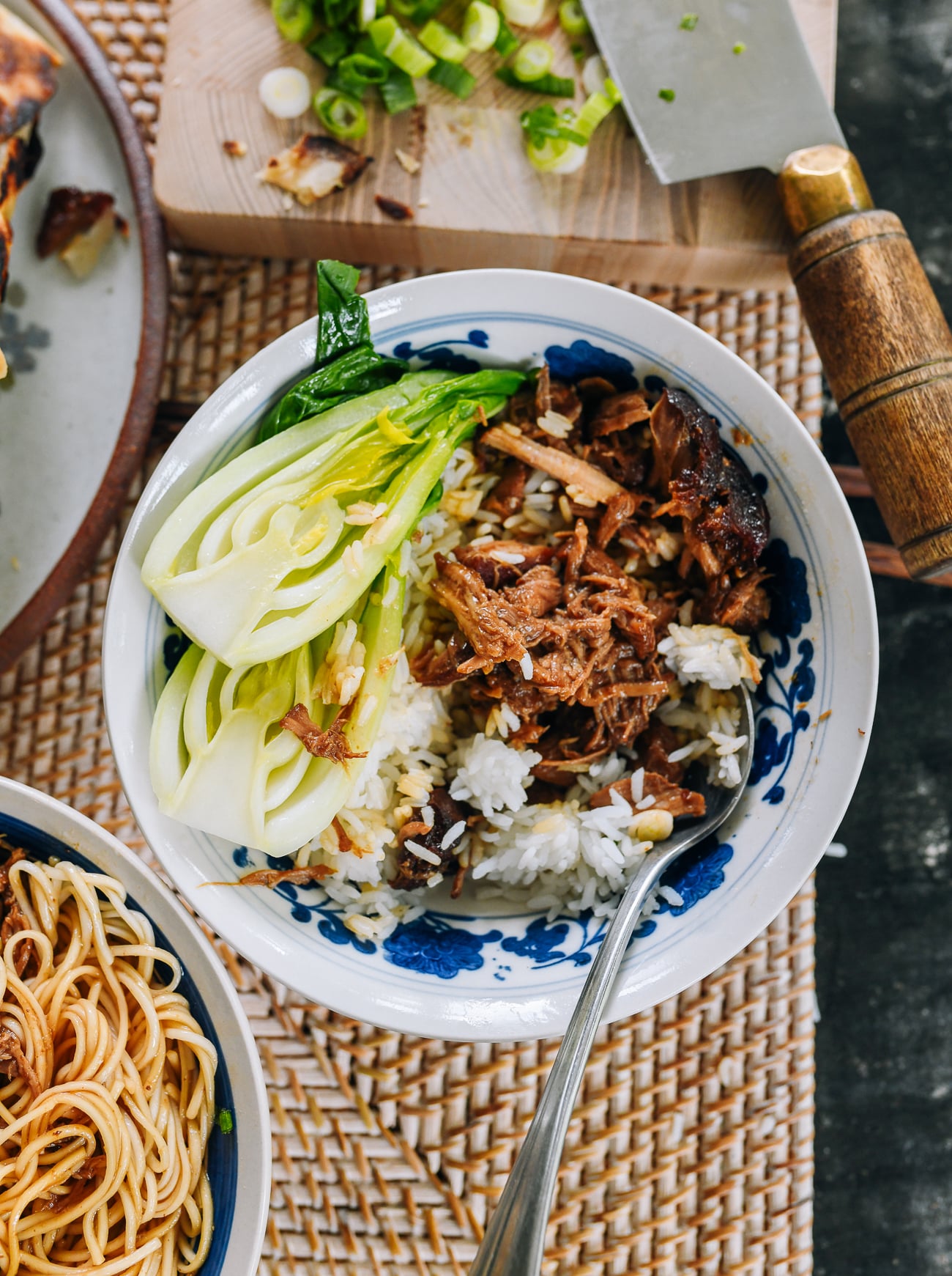 red braised pulled pork over rice with bok choy
