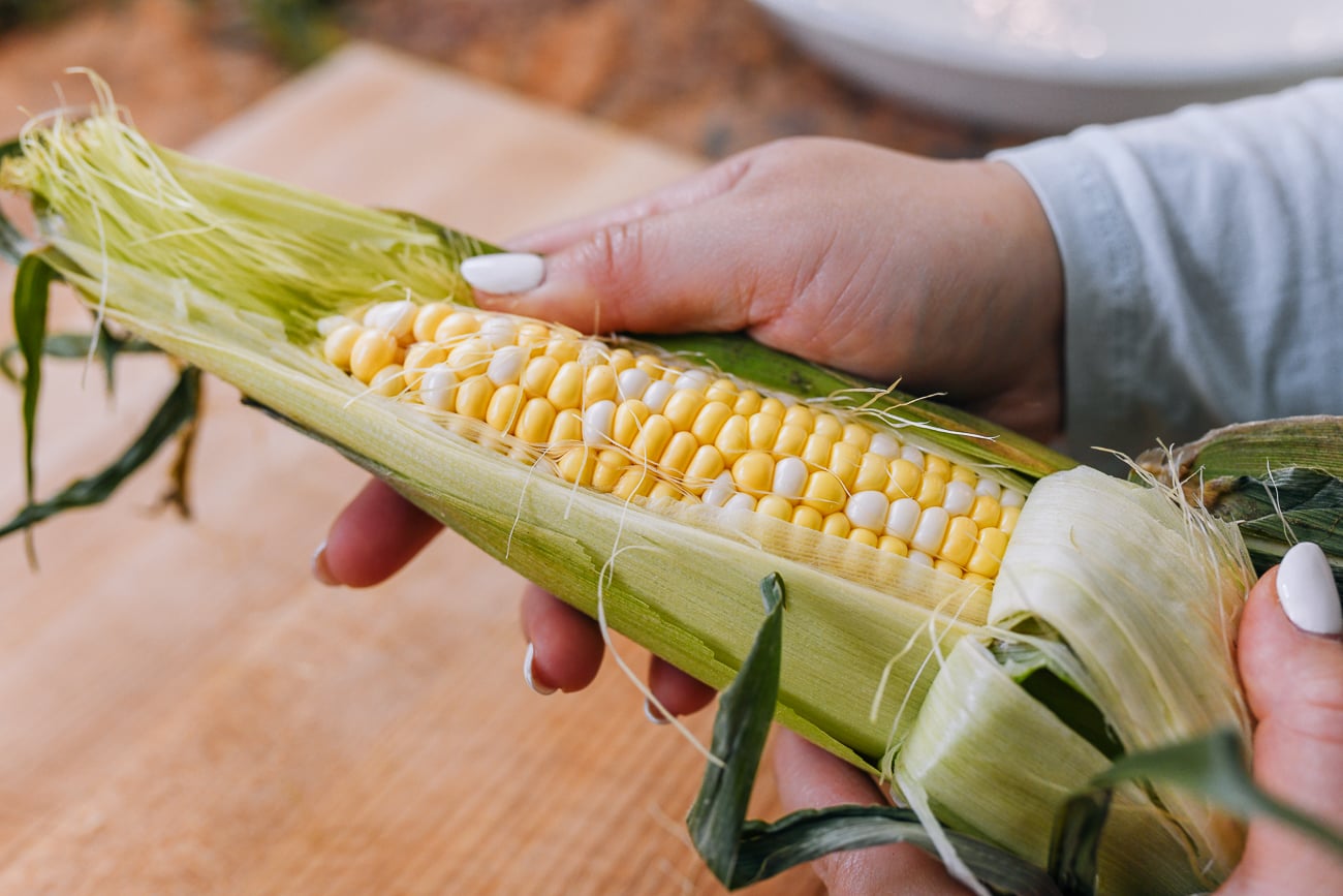 shucking corn