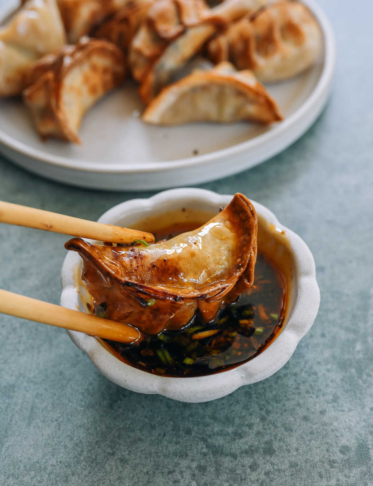 dipping air fryer dumping into sauce