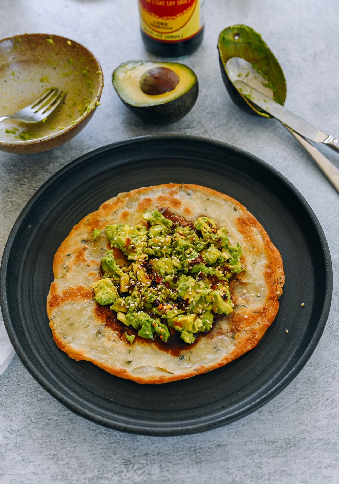 avocado scallion pancake with soy sauce and chili oil