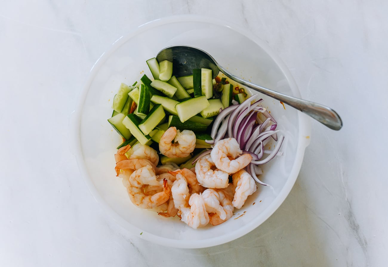 Cucumber, onion, and shrimp in bowl
