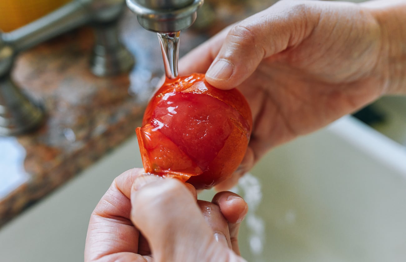 peeling frozen tomato