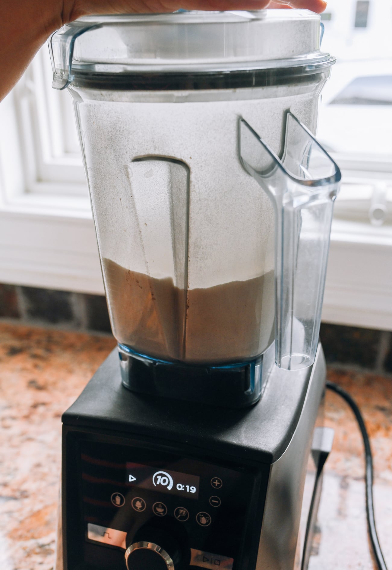 grinding rice into flour in the blender