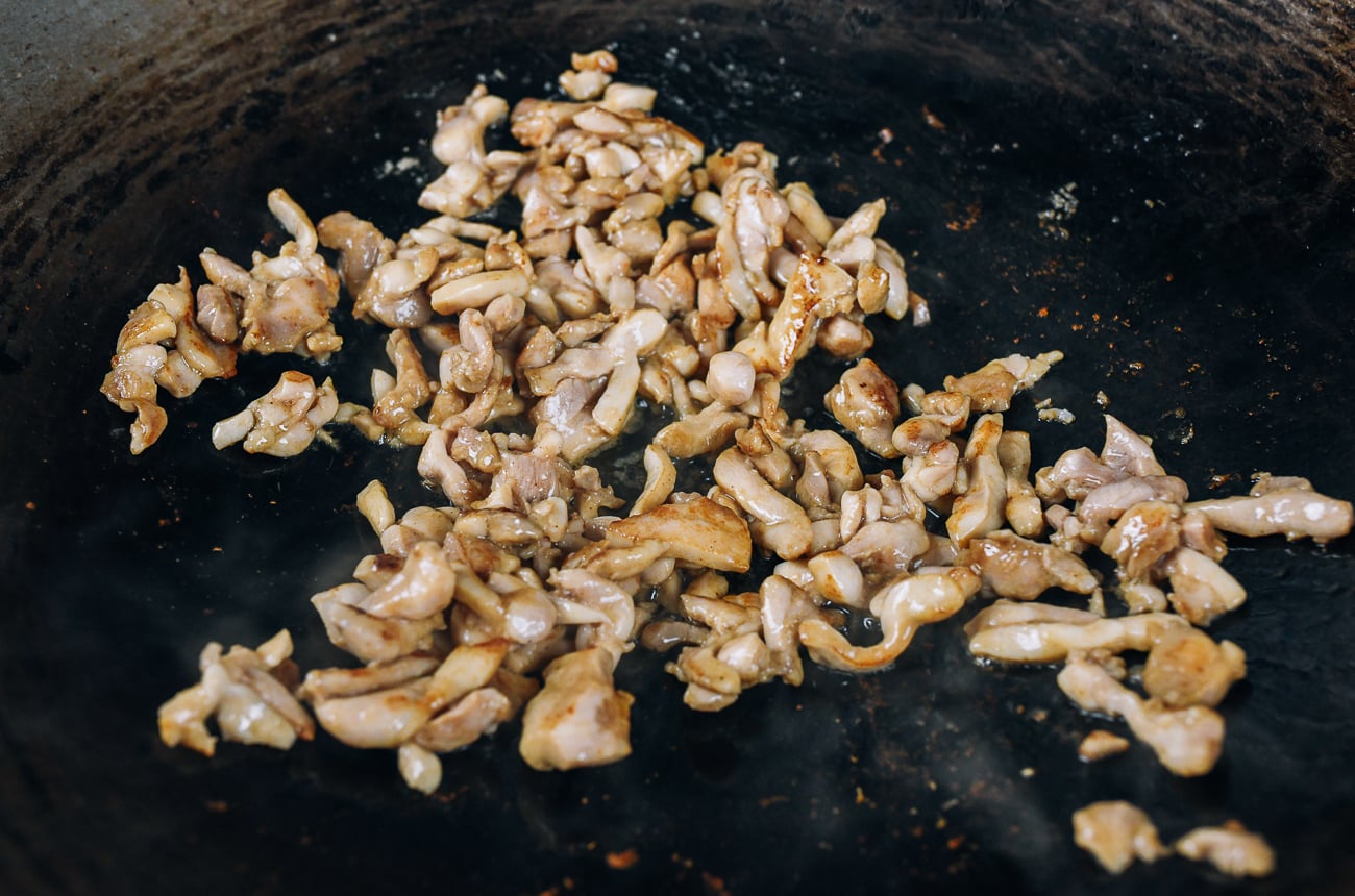 stir-fried chicken in wok
