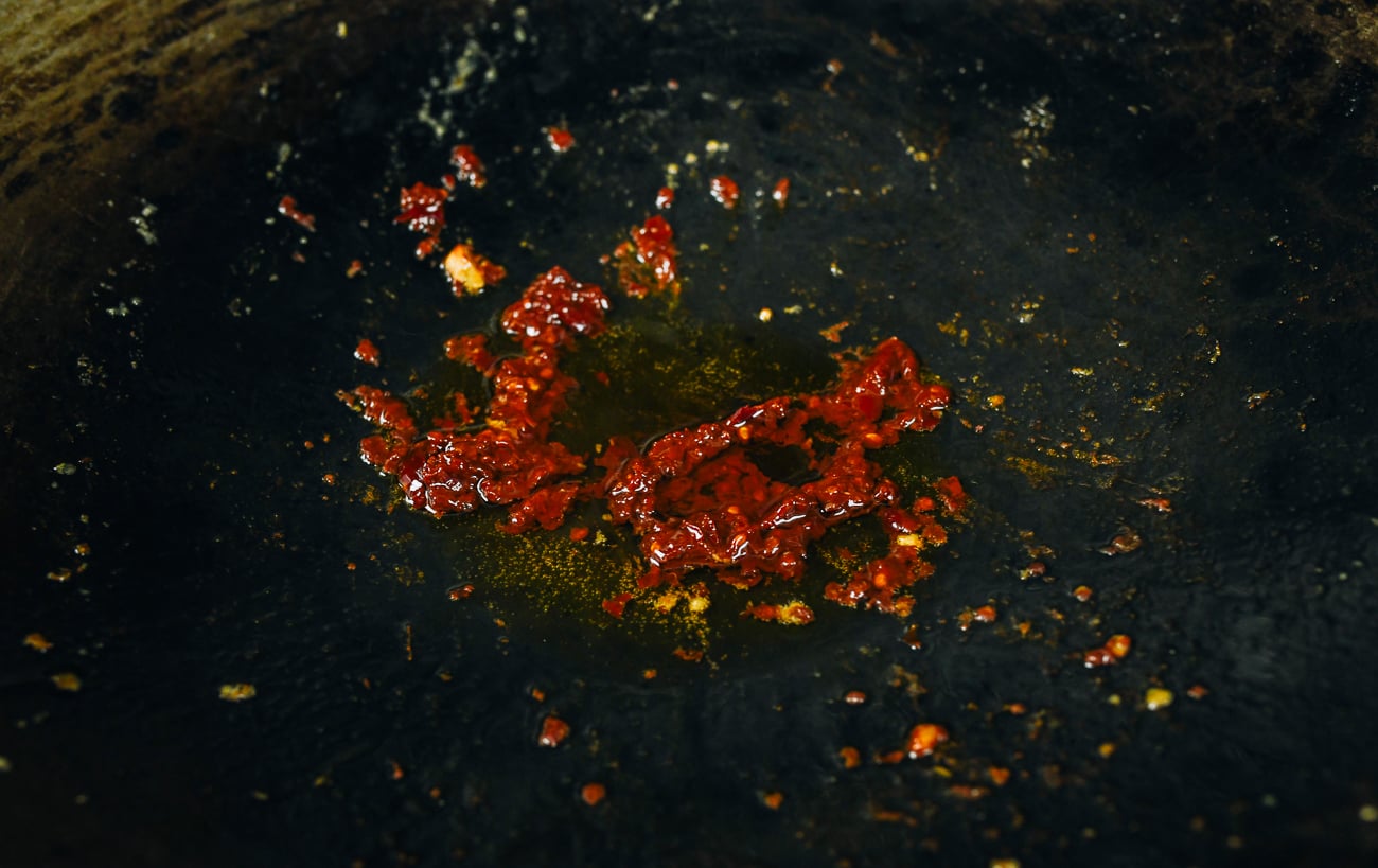 spicy bean sauce cooking in oil