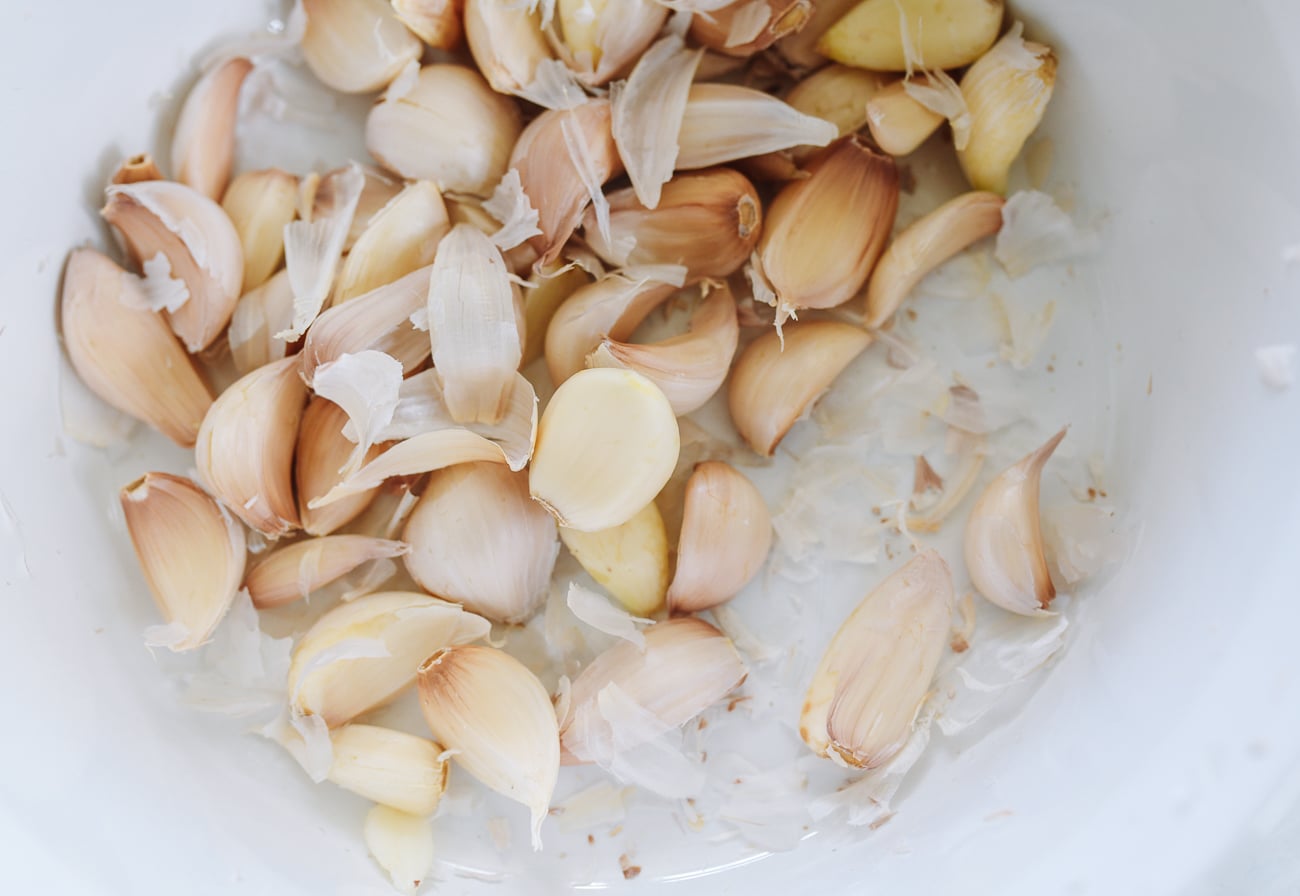 garlic cloves with skin coming off