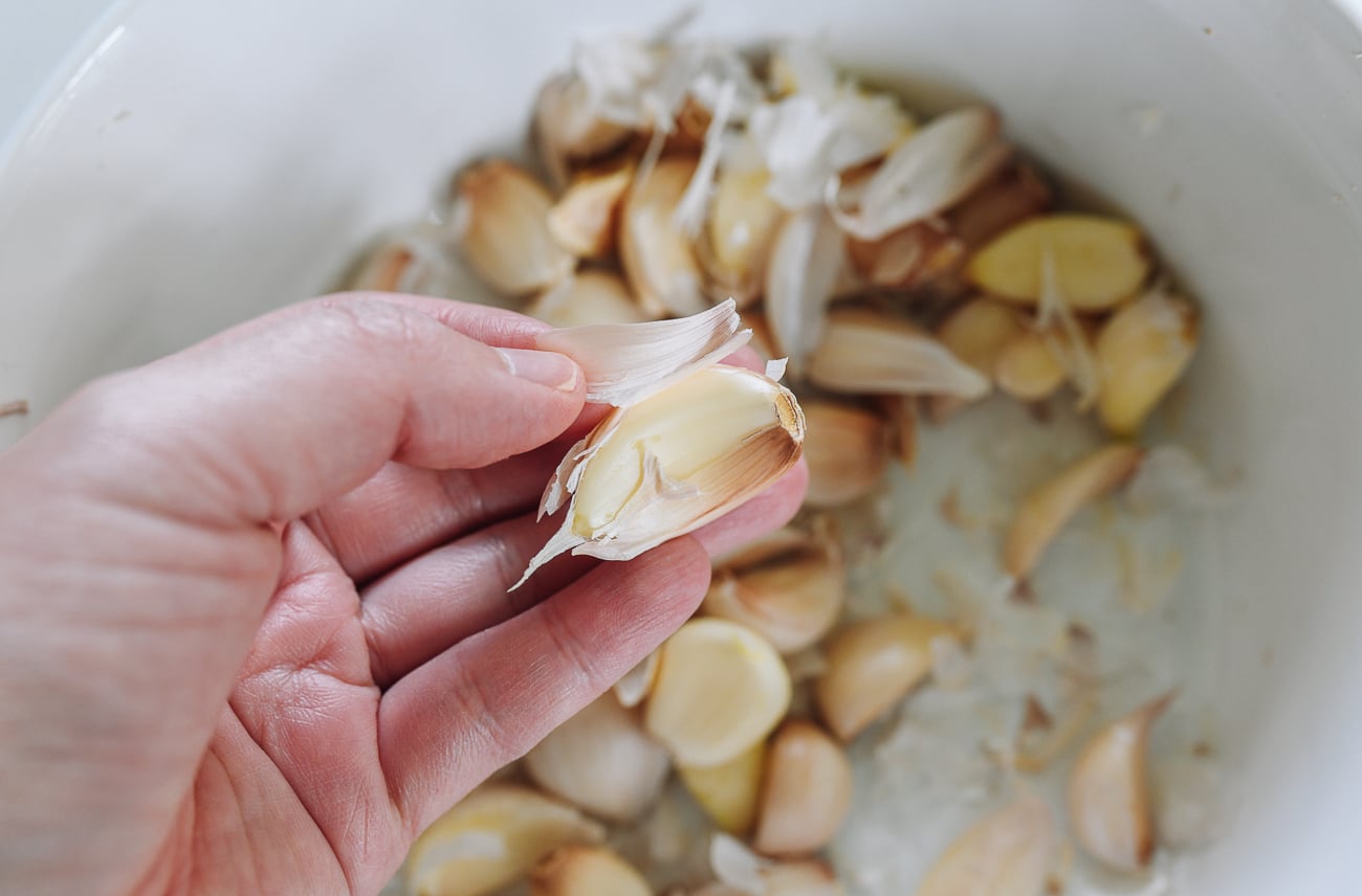 peeling a large number of garlic cloves