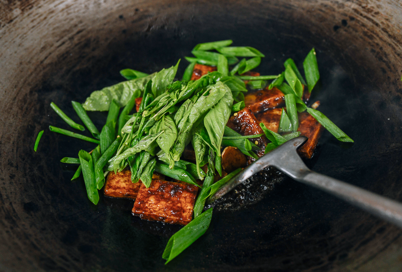 basil and scallion added to tofu