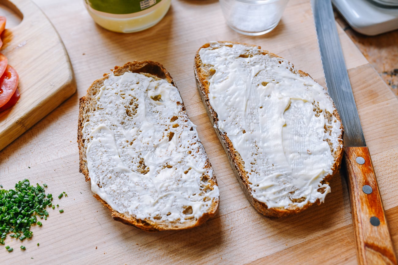 Mayonnaise spread on sourdough bread