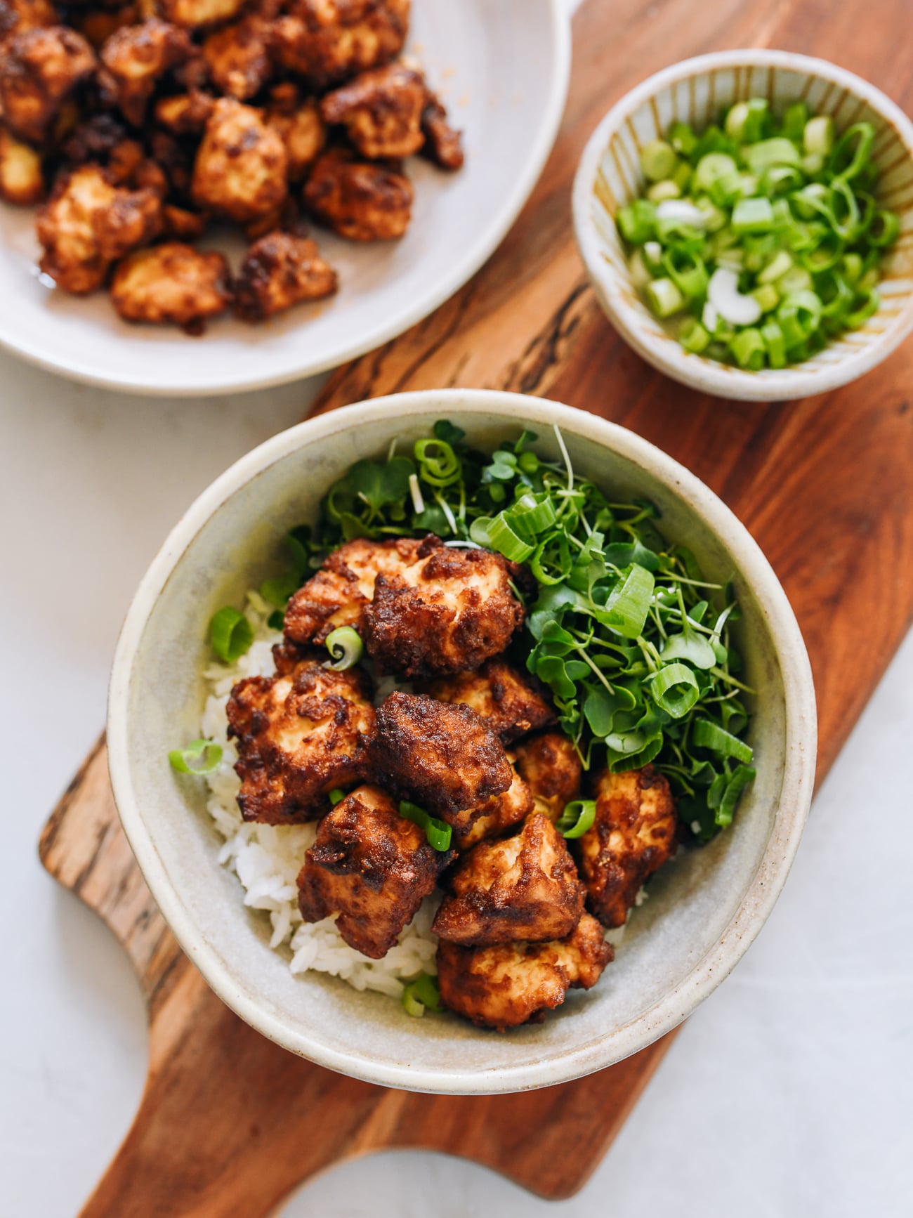 air fryer tofu in bowl with rice and veggie