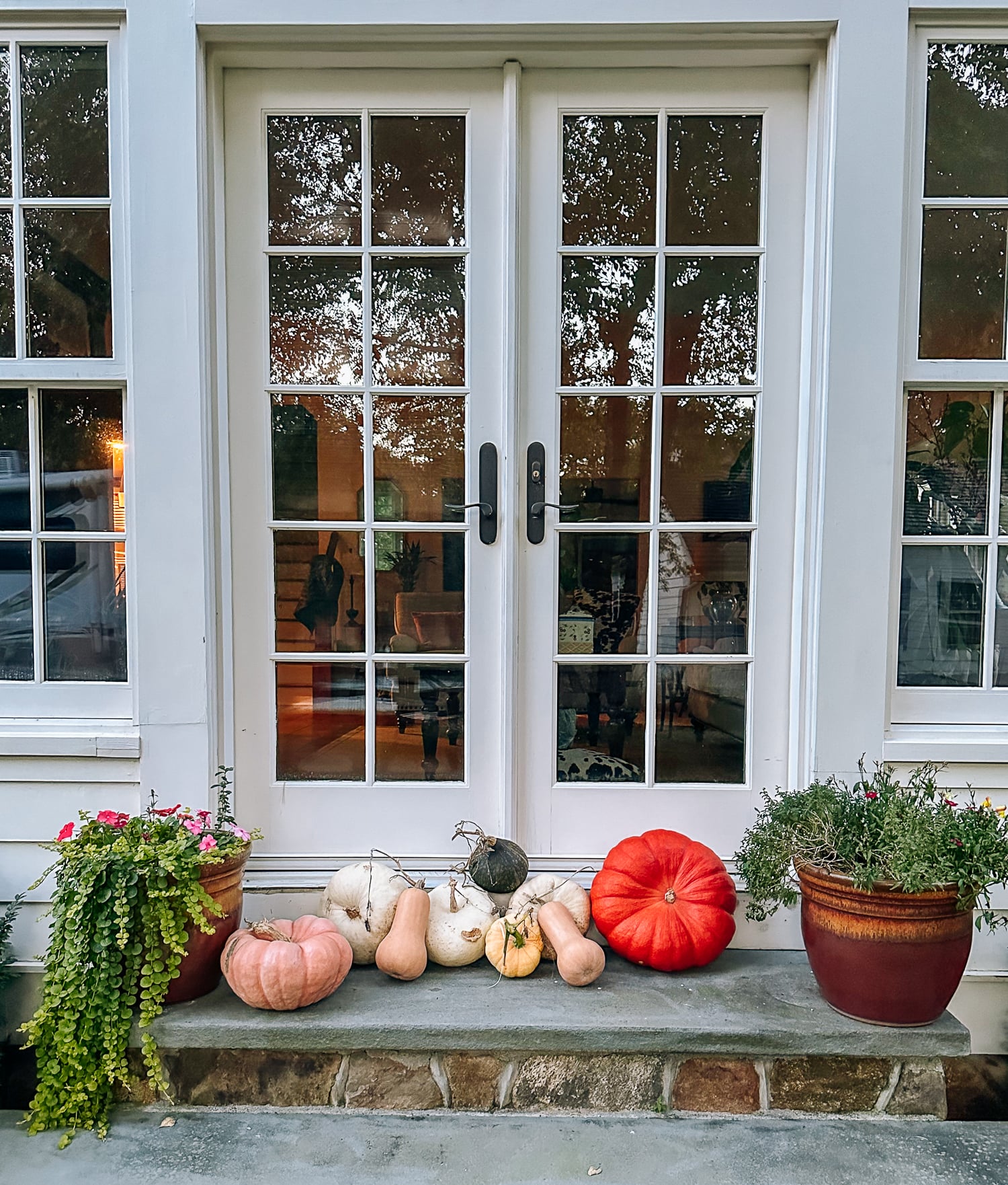 decorative gourds outside french doors