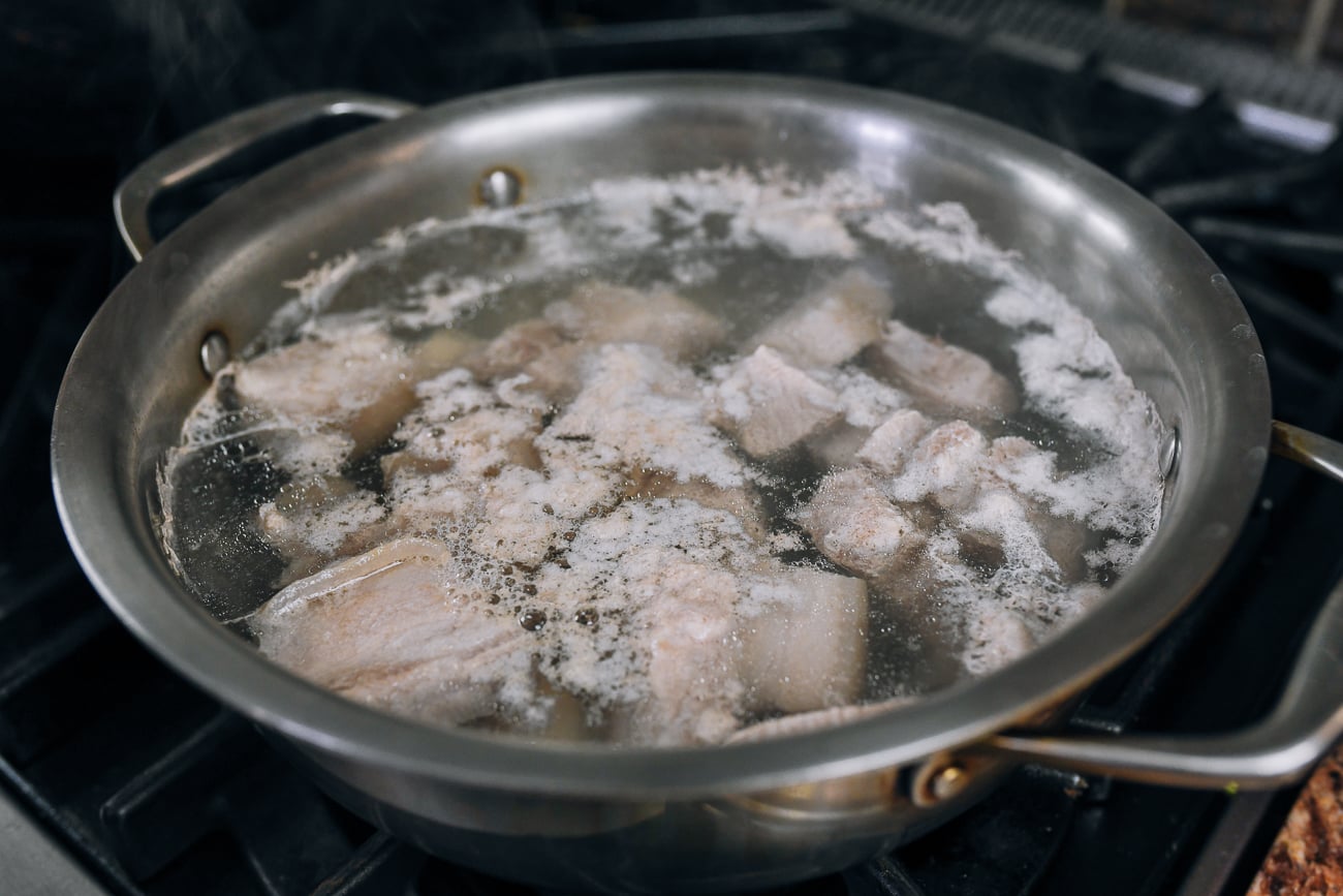 blanching pork belly pieces