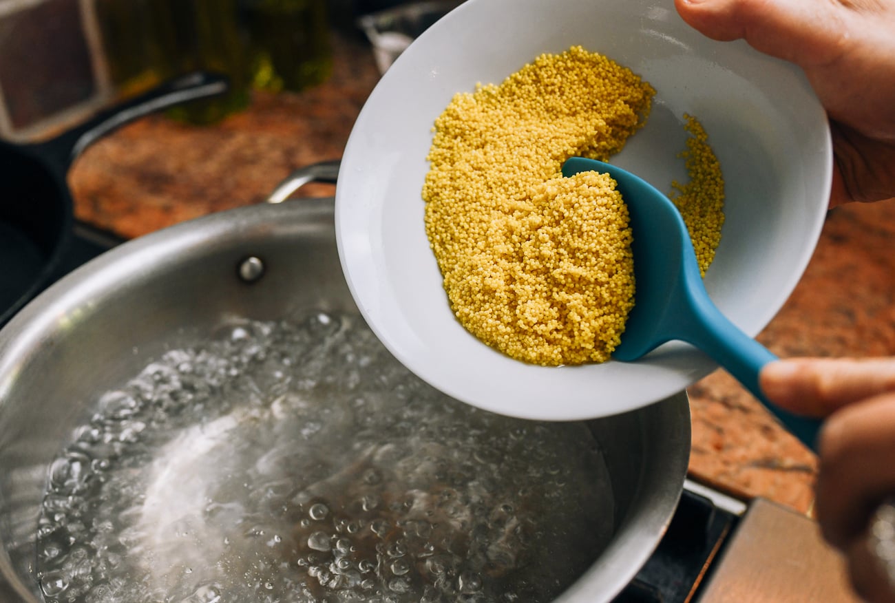 adding millet to boiling water