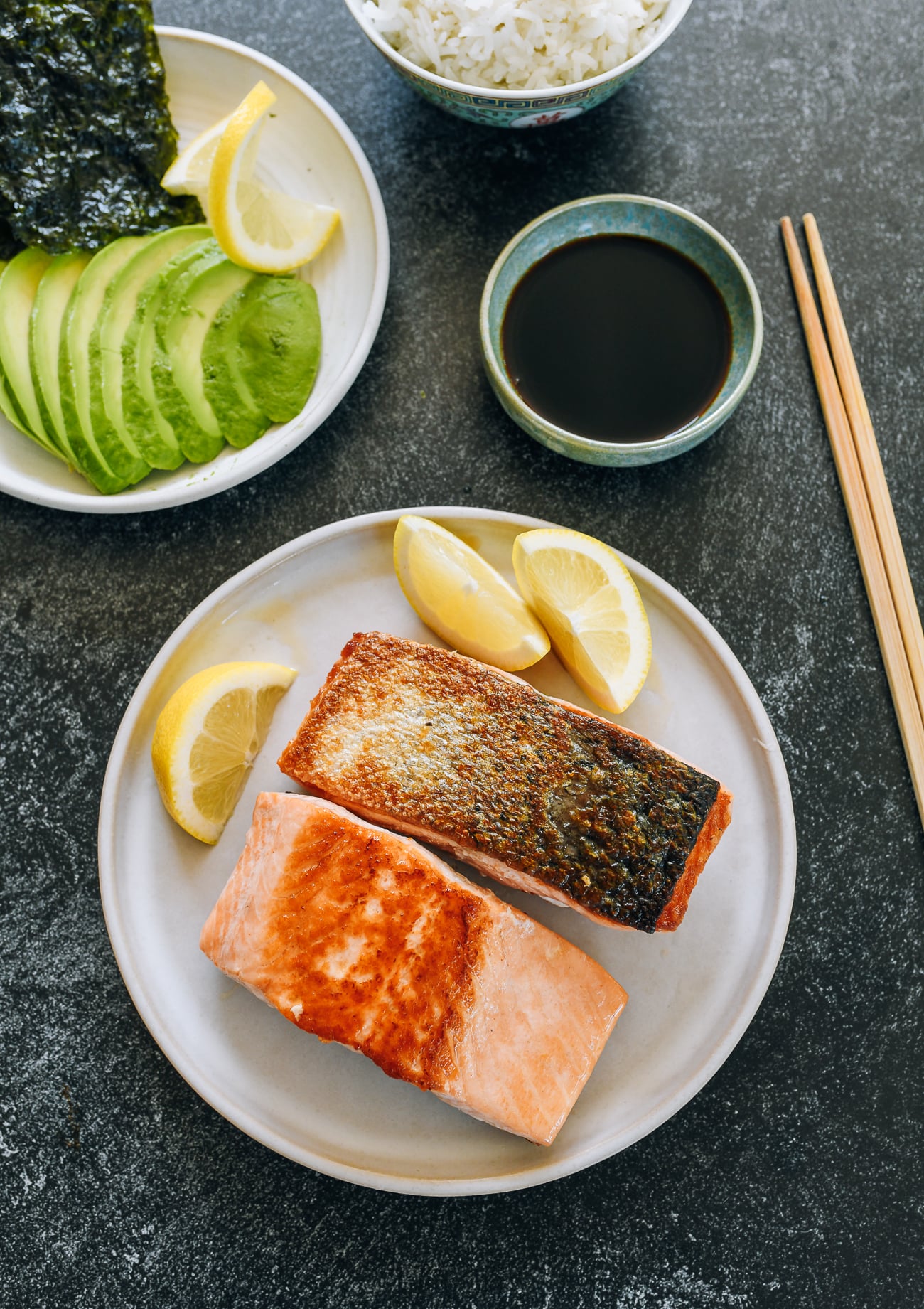 pan-seared salmon with lemon, avocado, seaweed, and soy sauce