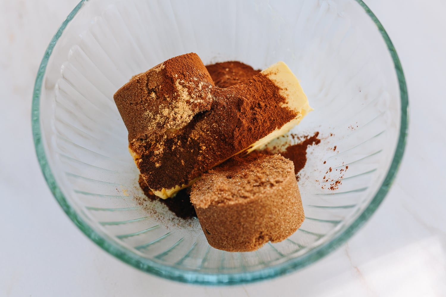 cinnamon roll filling ingredients in glass bowl
