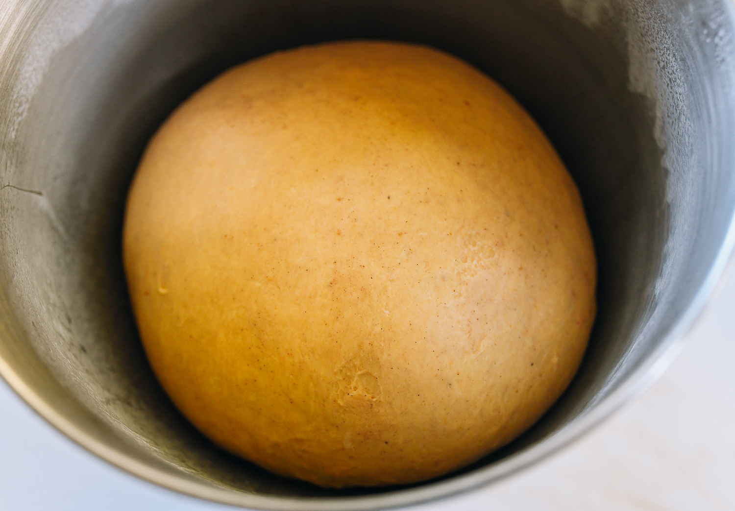 proofed pumpkin cinnamon roll dough