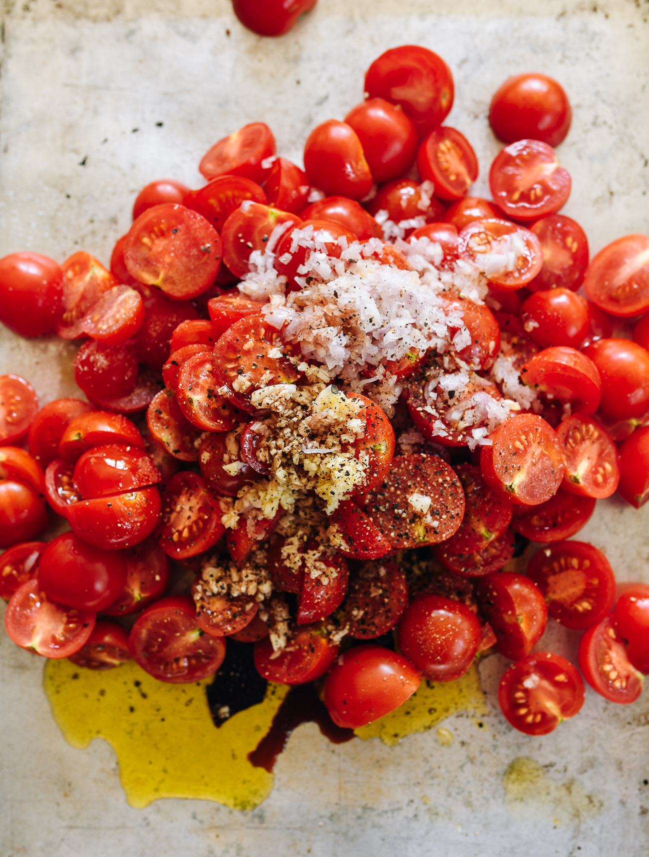 Tomatoes with olive oil, balsamic, shallot, garlic, salt, pepper for roasting