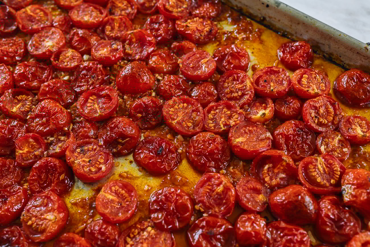 Oven roasted cherry tomatoes on sheet pan