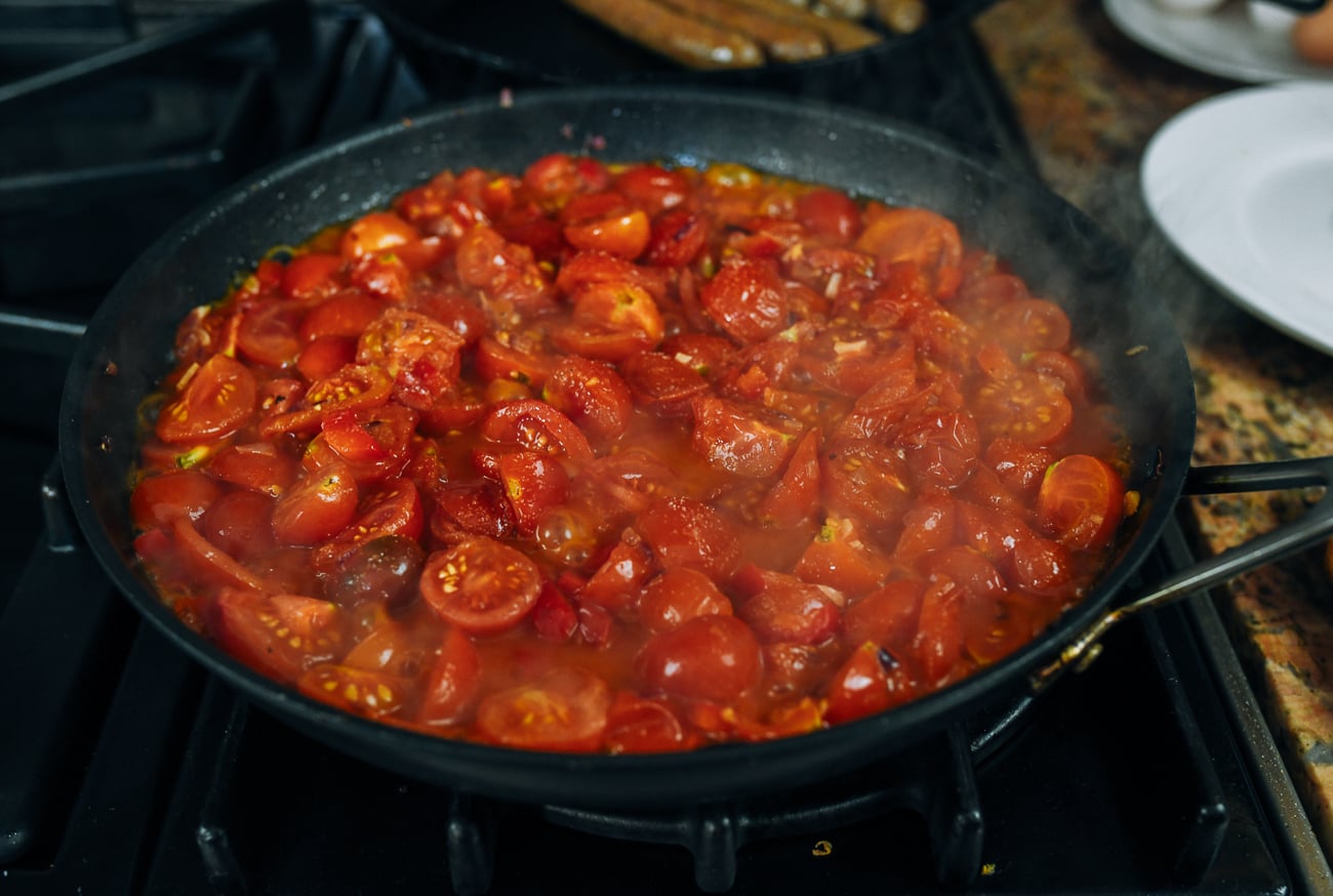 cooking tomatoes in skillet