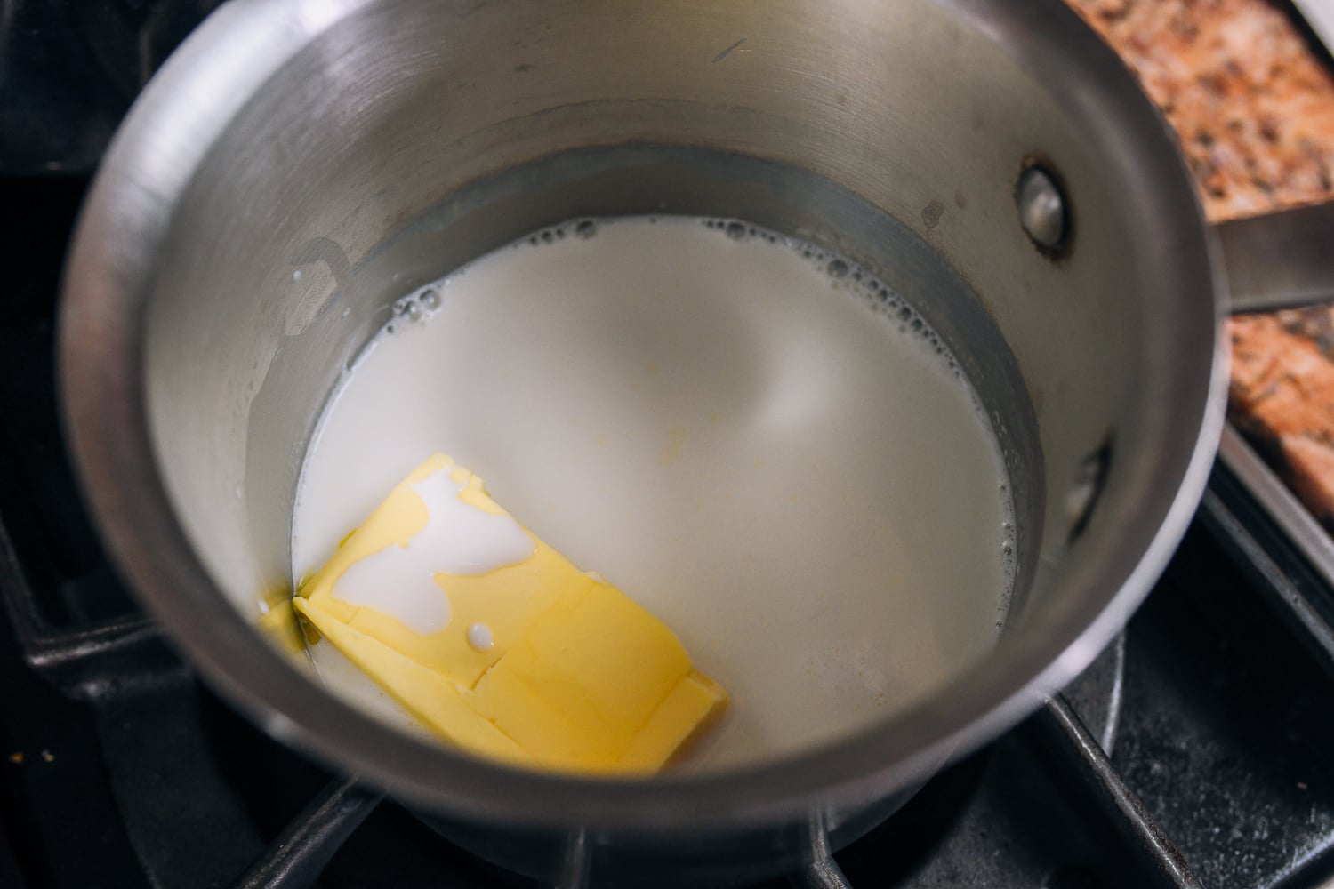 milk and butter in pot