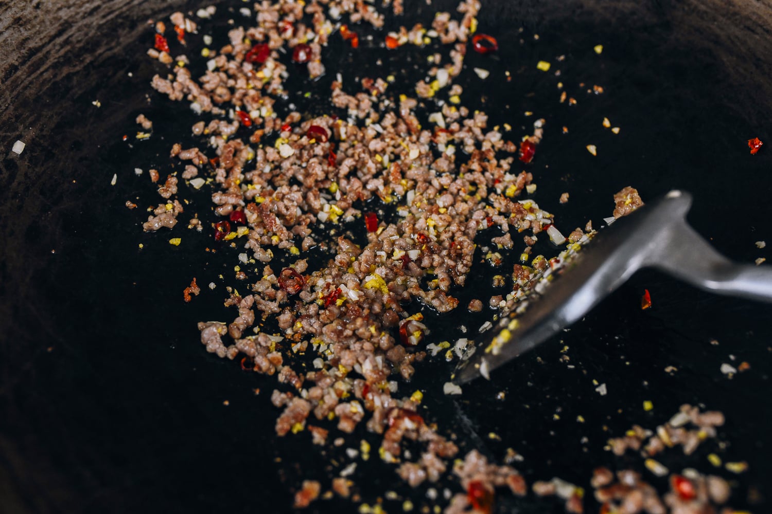 stir-frying ground pork