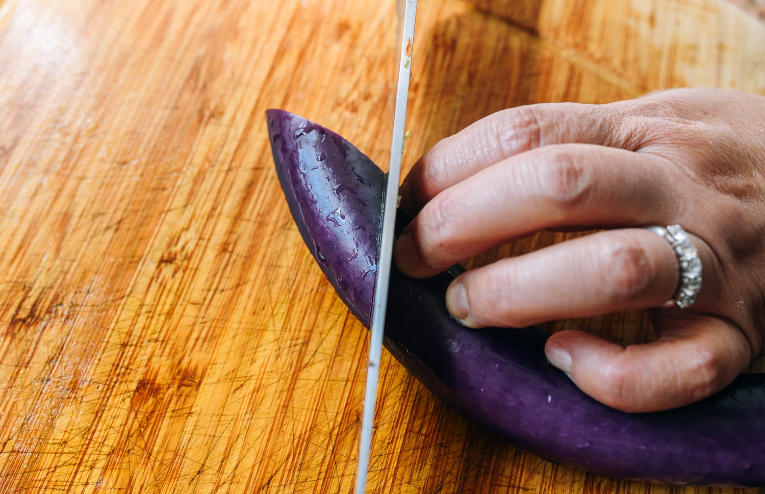 slicing Chinese eggplant on a sharp angle
